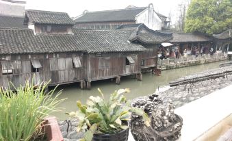 wuzhenshuimunianhuahotel - Housity