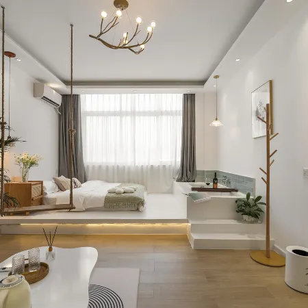 Qianxun Designer Homestay (Dengzhou Guangyi Sleepless City Branch)
