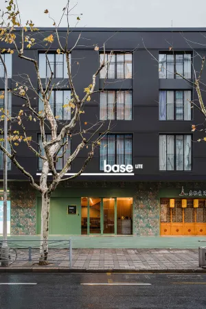 baseLITE-WESTBUND Serviced Apartment Отели рядом с достопримечательностью «Shanghai Xuhui Gymnasium»