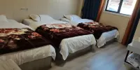 Aiweiyi Hotel - Cozy Triple Room