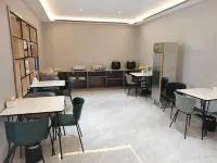 Home Inn Huaxuan Hotel Select (Zhoukou Taifuling Branch) - فطور