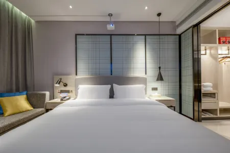 Yiyue Shanghe Hotel Отели рядом с достопримечательностью «Weichai University»