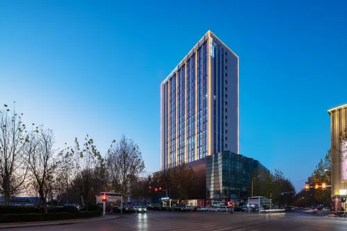 The GiorgioMorandi Hotels (Zaozhuang West Station Xuecheng Wanda Plaza) - ที่มีที่จอดรถ