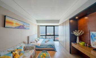 Xinsu E-sports Scenic Apartment (Qingdao Zhanqiao Railway Station)