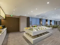 Moshe Light Luxury Qianxi Tower ViewHotel (Zhengzhou CBD Exhibition Center Branch) Hotels near ZZICEC