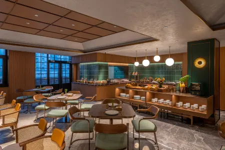 Orange Hotel (Dalian Development Zone Ansheng Square Branch) Отели рядом с достопримечательностью «Dalian Minzu University»