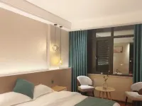 โรงแรมซินหยินโหลว (สถานีซวนเหว่ย) โรงแรมในซวนเหว่ย