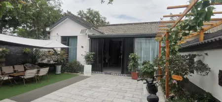 Cozy Courtyard View B&B (Xifu Old Street Branch) Отели рядом с достопримечательностью «Jintai Taoist Temple»