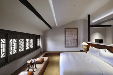 Suzhiji·Nanlou Chunxiao Holiday Homestay (Nanxun Ancient Town Baijianlou Scenic Area) Отели рядом с достопримечательностью «Zhejiang University of Water Conservancy Hydropower (Nanzhang Campus)»