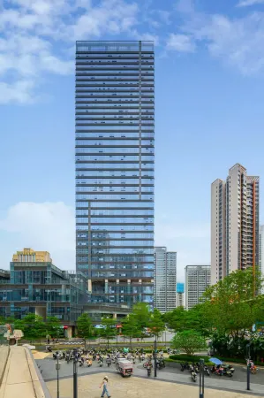 Qiuding Hotel Apartment (Shenzhen Daxing Center Longcheng Park Subway Station Store) Отели рядом с достопримечательностью «Shenzhen World University Games Sports Center»