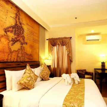 Palm Grass Hotel Отели рядом с достопримечательностью «Магелланов Крест»