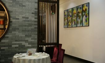 Caribbean Hotel (Zhongshan Xiaolan Daxin Xinduhui Store) - Housity