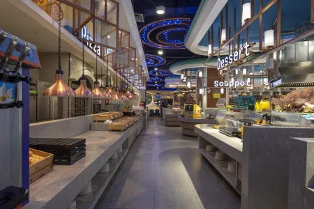 Vienna Hotel (Wuyuan Moore City store) Отели в г. Уюань