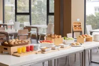 Echarm Hotel (Zhaoqing Sihui Tianguangxu Market) فنادق في سى خوي