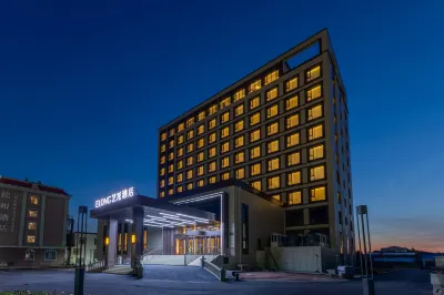 Mohe Yilong Hotel (Municipal Government Branch) Отели рядом с достопримечательностью «Сунхуа оригинальный лесной парк»