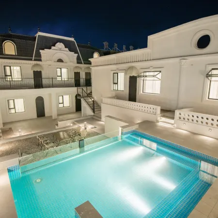 Tekes Manshan Homestay (Shengshi Huajiang Bagua City Night Scenic Area) Отели в г. Текеси