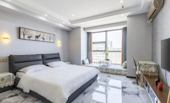 Tuyuan Holiday Apartment (Weihai Railway Station Hanlefang West Street)