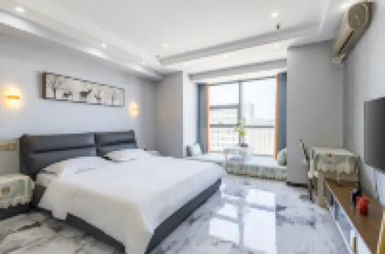 Tuyuan Holiday Apartment (Weihai Railway Station Hanlefang West Street)