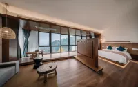 Dujiangyan Shili Mountain Jing Private Tang Hot Spring Resort Hotel (Qingchengshan Branch) - بار