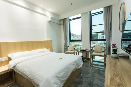 Lucky Orchid Hotel Отели рядом с достопримечательностью «Sanbaishan Mountain Scenic Area»