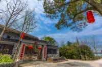 Yuyang Gengdu Jiangyuan Inn