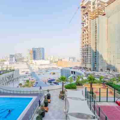 Lovely Studio with Cozy Balcony and Outdoor Pool Fitness & Recreational Facilities