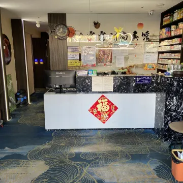 Qitaihe Jinwowo Fashion Hotel