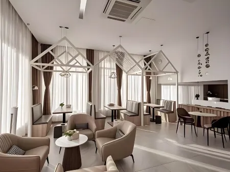 YUANJU HOMESTAY Отели рядом с достопримечательностью «Qiongtai Normal University (Guilinyang Campus)»