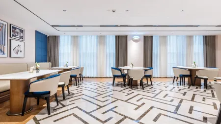 LANOU INTERNATIONAL HOTEL Отели в г. Цюйцзин