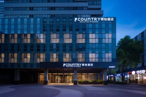 Country Inn & Suites Country Inn & Suites  Wuhan Living Room-  Polar Ocean Park - جاكوزي