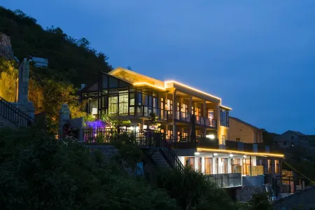 Wenling Yiju Yard Отели рядом с достопримечательностью «Wenling Shitang Peninsula Tourist Resort»