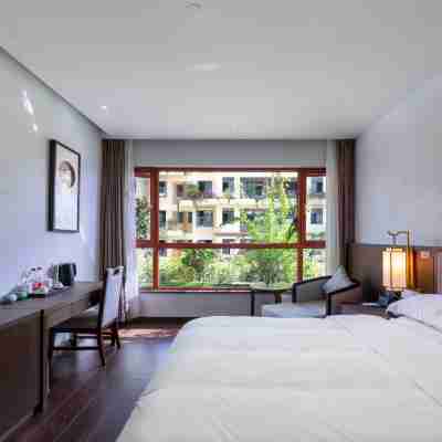 墨江蘭亭園大酒店 Rooms