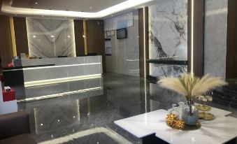Maoming Bincheng Business Hotel (Dianbai Wanda Plaza Donghu Park)