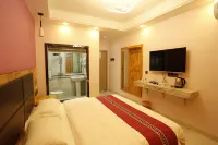 Xishuangbanna Jinghong Xinshijia Hotel (Gaozhuang Star Night Market)