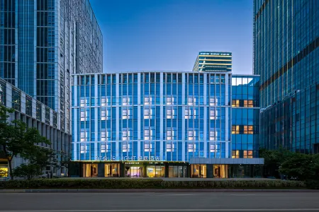 Wuxi Taihu  New City Financial Street Light Hotel Отели рядом с достопримечательностью «Wuxi Changguangxi National Wetland Park»