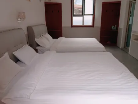 Yinan Juquan Homestay (Zhuquancun) Отели в г. Инань