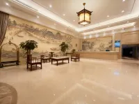 Yuanzhu Huaxia Hotel (Zhoushan Bus Passenger Transport Center Dinghai Baolong Tiandi)