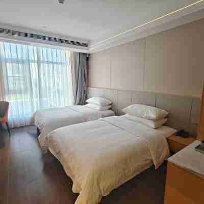 怡程酒店（柳州音樂噴泉銀泰城店） Rooms