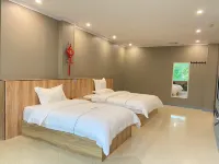 Baoting Caiyuan Hotel