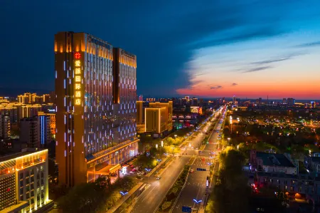 Ai Pai International Hotel, Shihezi Отели рядом с достопримечательностью «China Jade Garden»