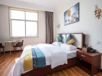 Qixinda Business Hotel (Jiaozhou Bus Terminal Shop)