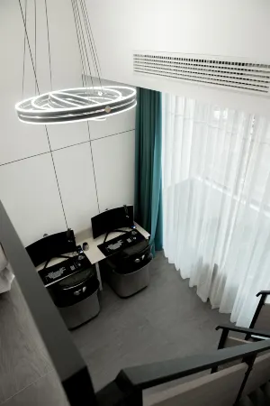 Coffee Cat E-sports Hotel (Huaibei Wuyue Plaza Branch) Отели рядом со станцией Huaibei Railway Station