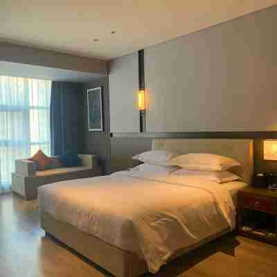 Xinhua Chiyou Huamei Hotel Rooms