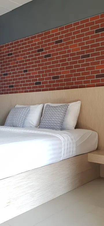 ห้องดีลักซ์ เตียงใหญ่ 1 เตียง