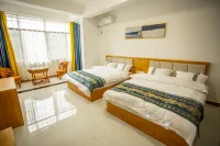 Menglun Wenyan Homestay - شرفة