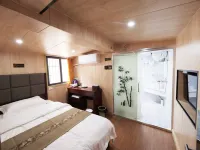 Dexin Business Hotel Hotels in Tonggu County