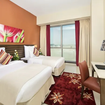 Abidos Hotel Apartment Dubai Land Отели рядом с достопримечательностью «Парк аттракционов Global Village»
