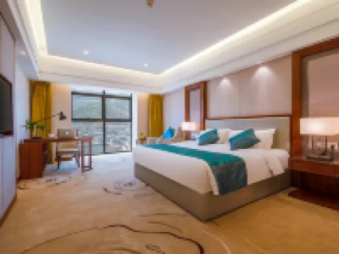 Xin Ding Hotel Hoteles en Huize