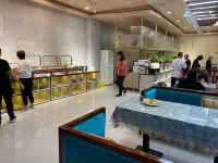 Xinmao Ruihua Hotel - servizio colazione