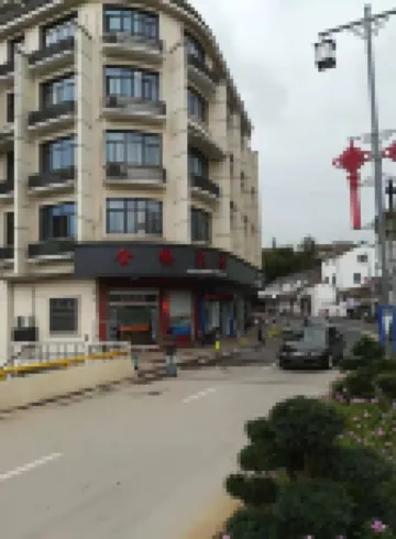 Xinchang Jinqiao Hotel